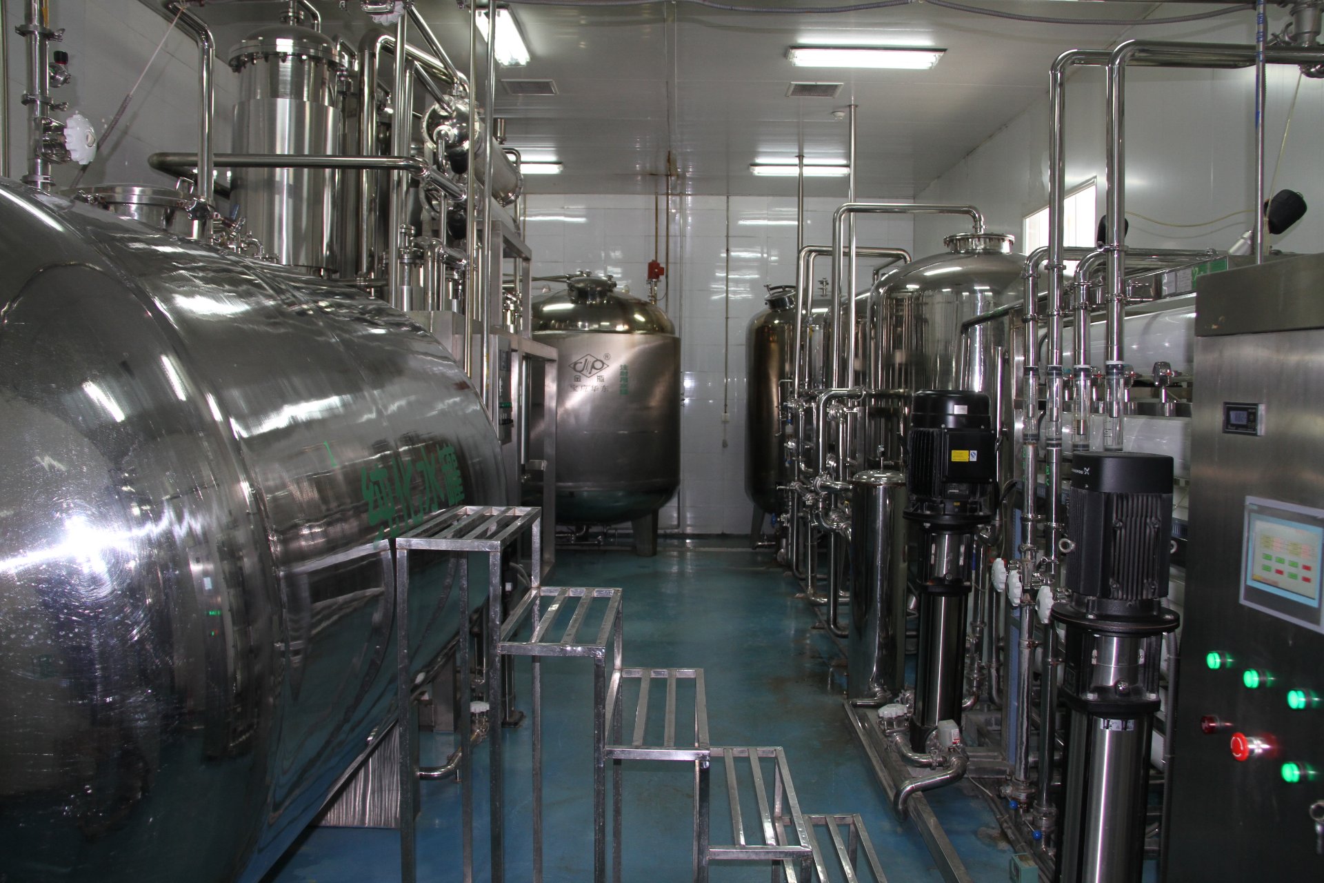 Pharmaceutical water system with stainless steel storage tanks and RO pumps